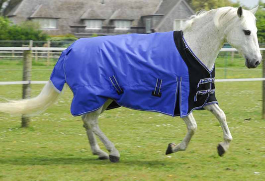 Rhinegold Elite Storm Rug With Waterproof Stretch Chest Panel - Top Of The Clops
